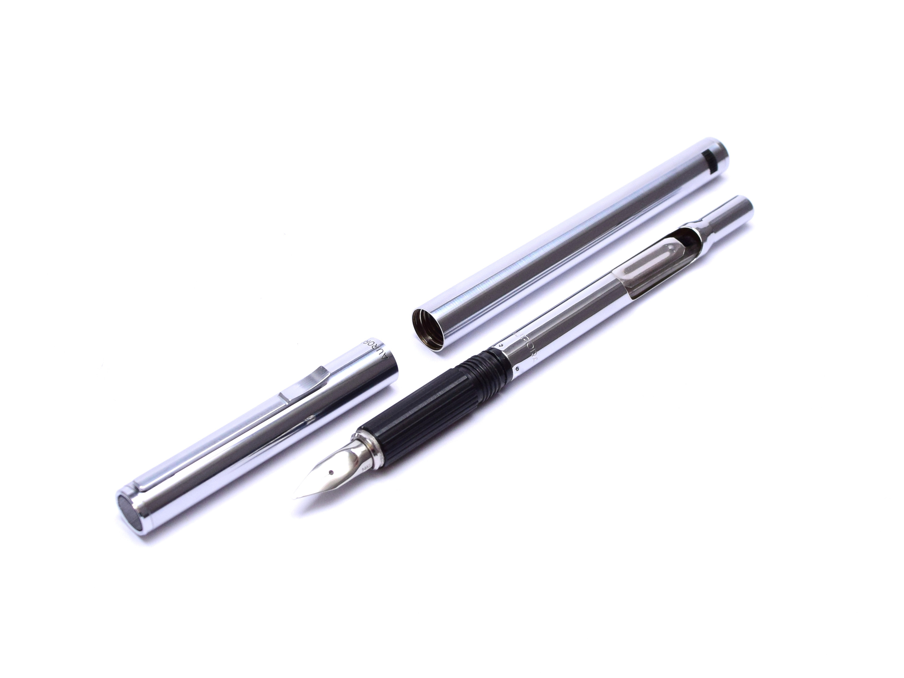 Beautiful 1970s AURORA Hastil Polished Stainless Steel 14K White